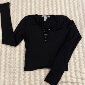 ReVamped black long sleeved top. Women’s extra small.